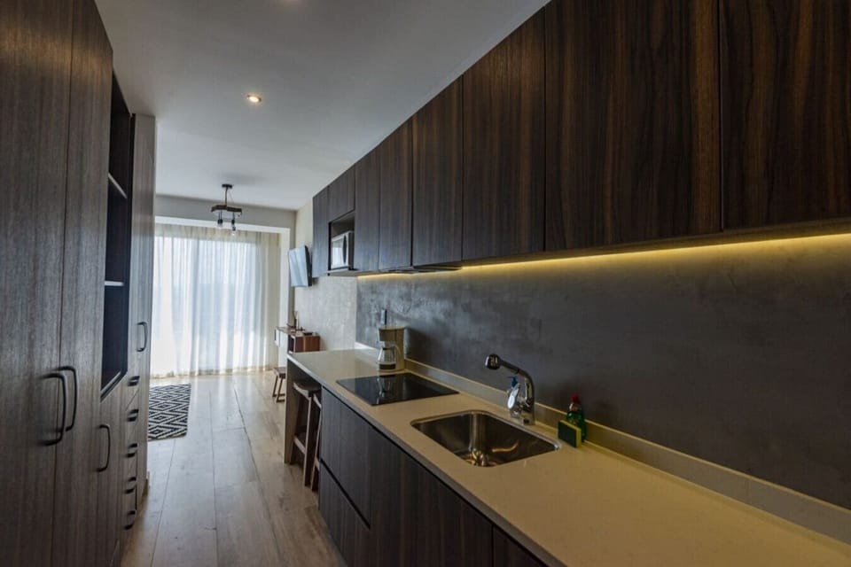 Cook in style—wood-accented kitchen with premium appliances