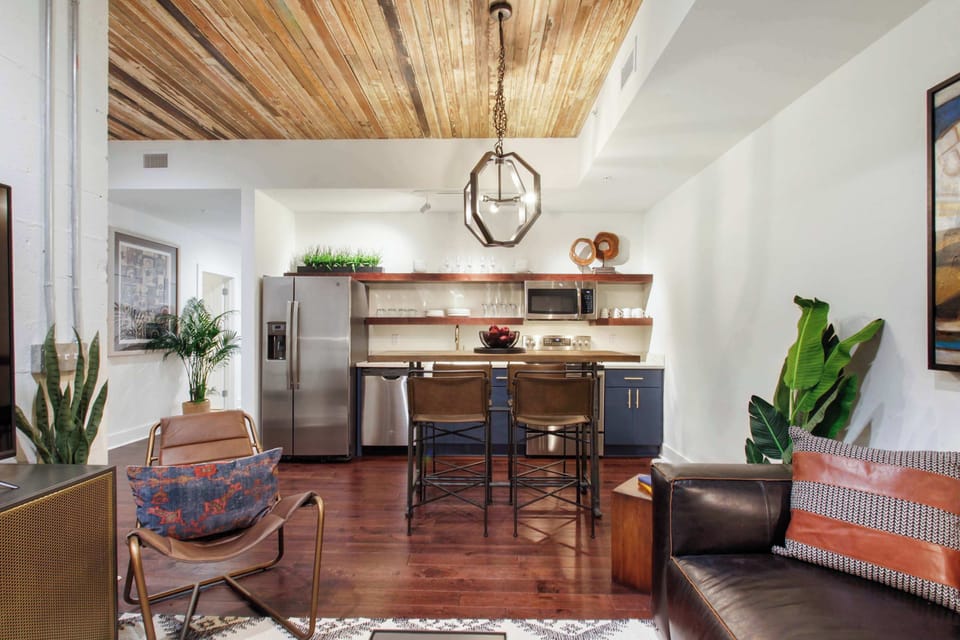 Unit 202 | Open Concept Chef's Kitchen | Fully Stocked | Open to Living | First Floor of Second Floor Unit