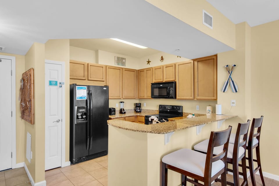 Kitchen with eat-in bar seating