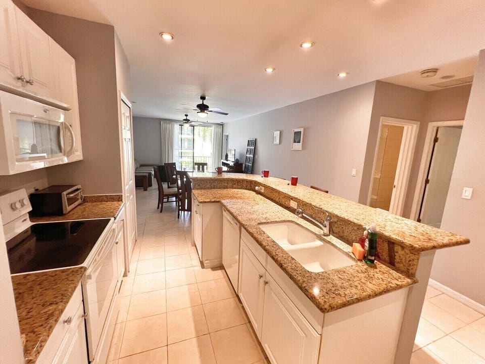 The kitchen has a full-sized fridge, stove, microwave, dishwasher and stacked washer/dryer.  The kitchen is well-equipped and includes many small appliances including a kettle, coffee maker, espresso machine, rice cooker, and a toaster oven.