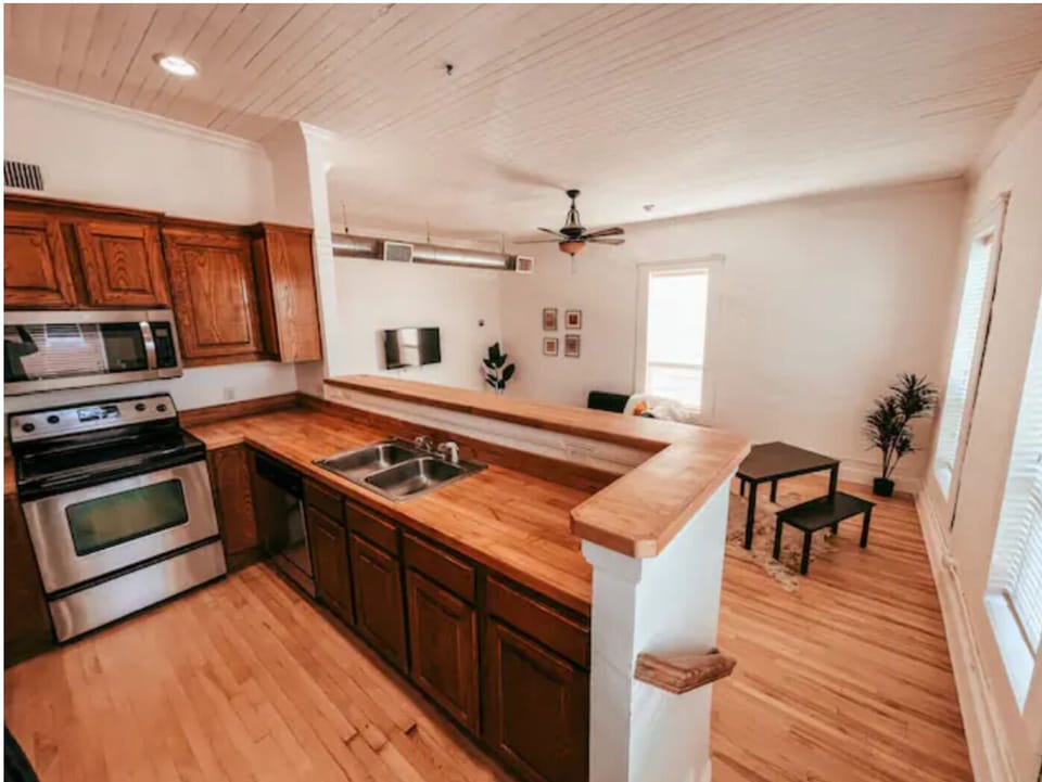 Step-up kitchen with full view of the loft. 