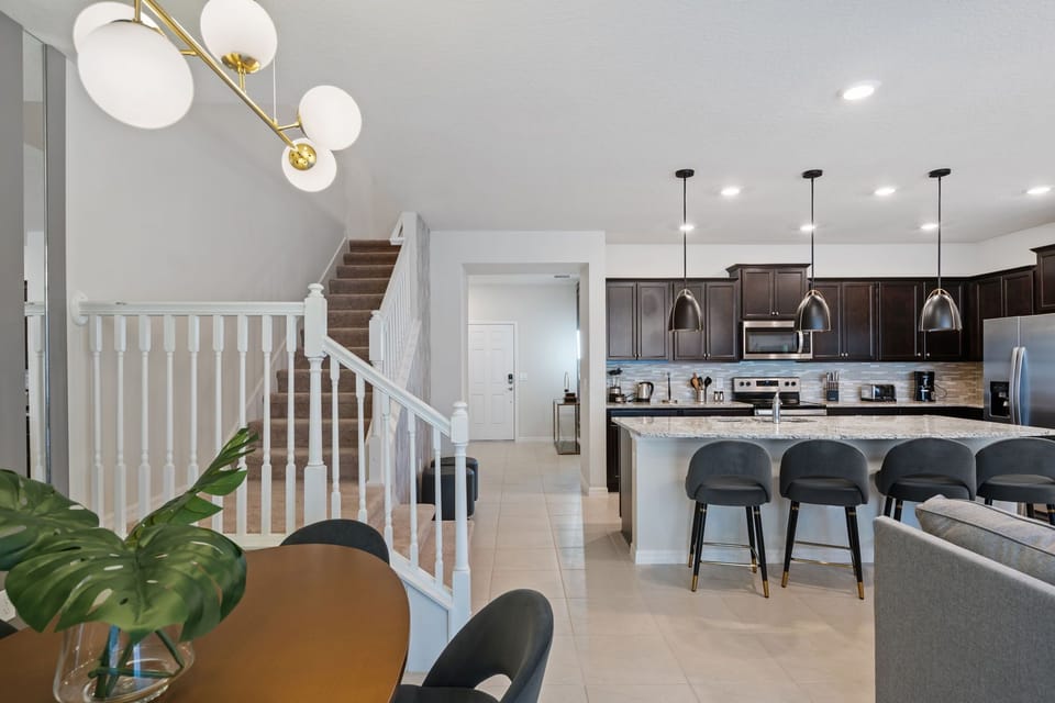 Open Concept Elegance: Dining, Living, and Kitchen in Perfect Harmony