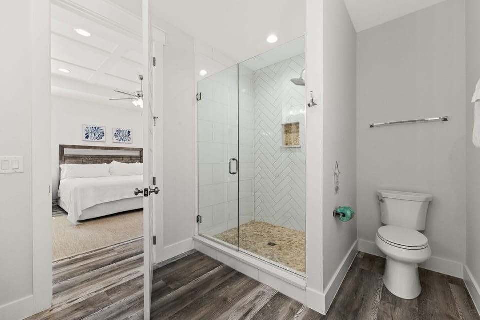Upstairs Primary Bathroom with Double Vanity and Walk-In Shower