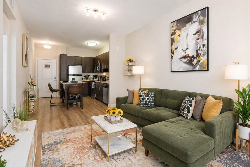 The open layout of the main living space makes it easy to watch TV, cook a meal, and socialize all at once.