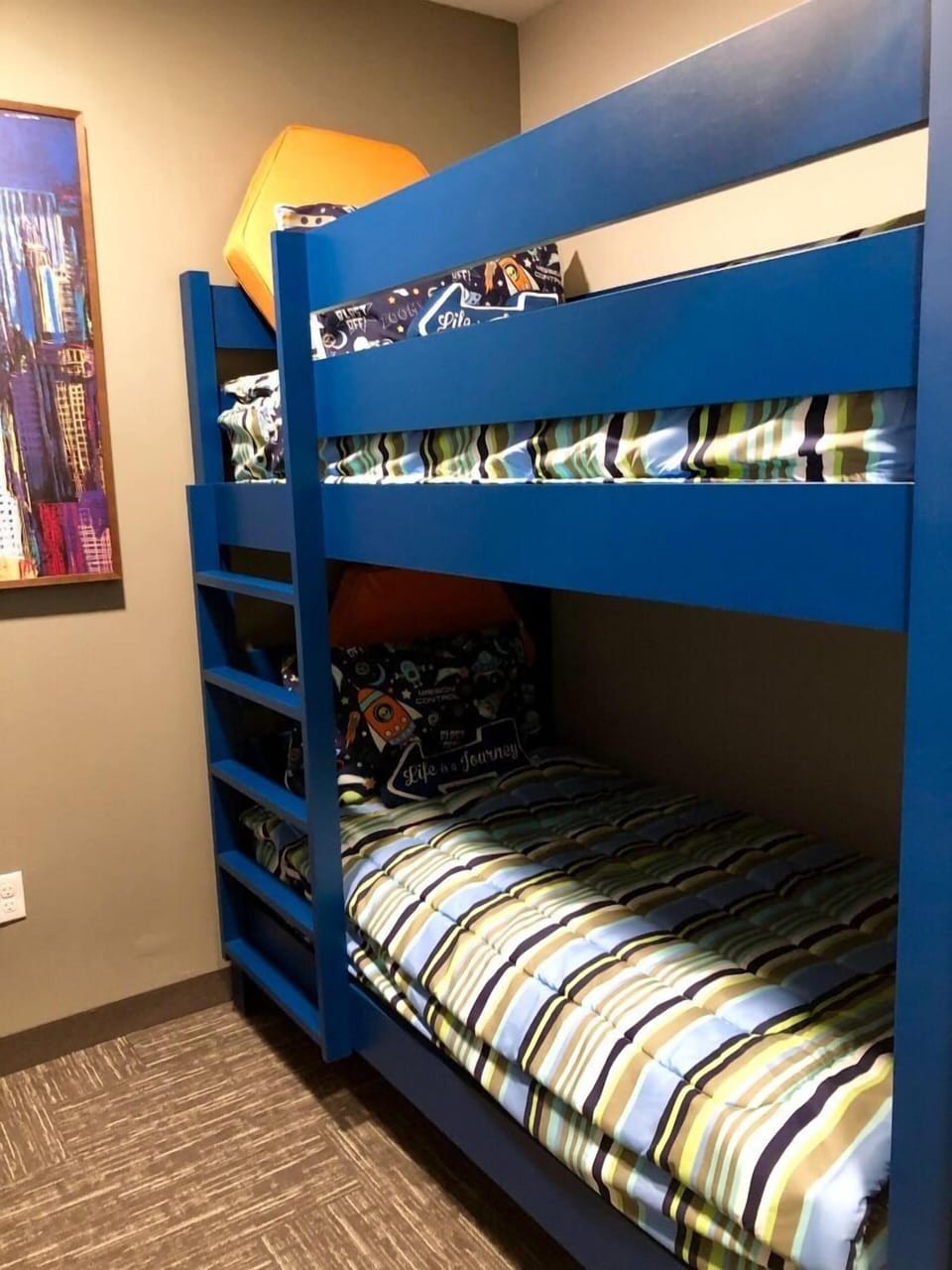 Climb into colorful bunks and enjoy a playful night’s sleep.