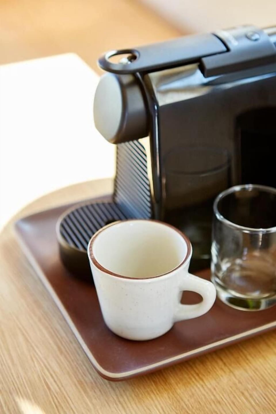 Start your morning with fresh espresso, steps from bed.