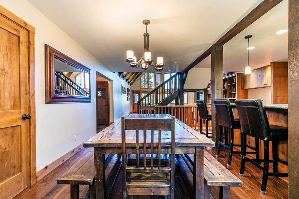 Conveniently located next to the kitchen, the large dining table provides plenty of room for your group to enjoy meals together.