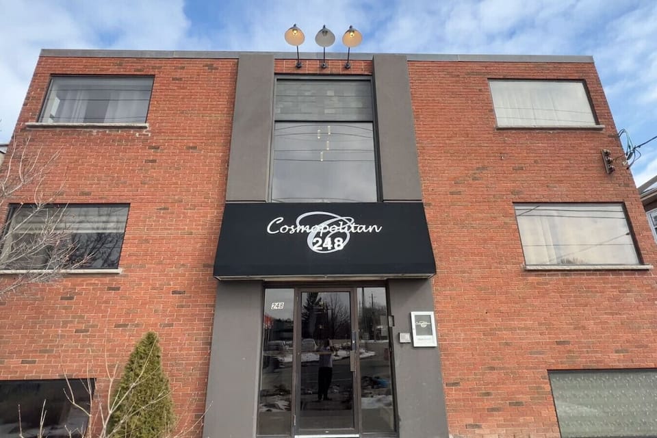 Classic red brick charm with a modern touch—welcome to your cozy home away from home!