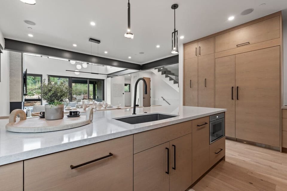 Cook, order in, or do both — the kitchen and dining space are designed to keep things simple and social