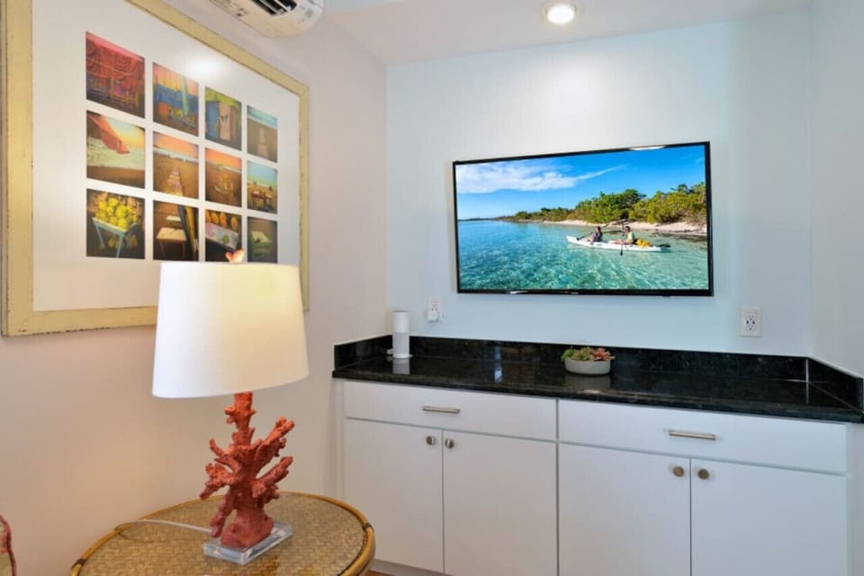Original art by Robin Hix adorns the walls, outlets with USB charging availability.  Large Alexa to enjoy music..