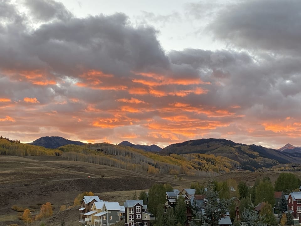The sky is on fire from your private balcony. 