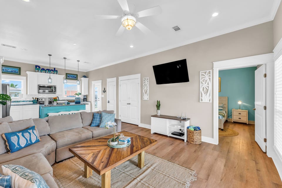 Relax in the living room on the comfortable couch while enjoying your favorite shows (3)