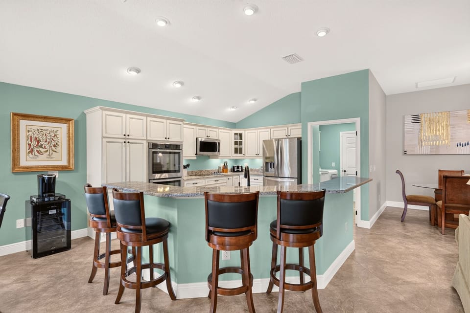 Kitchen island w/ four seats. 