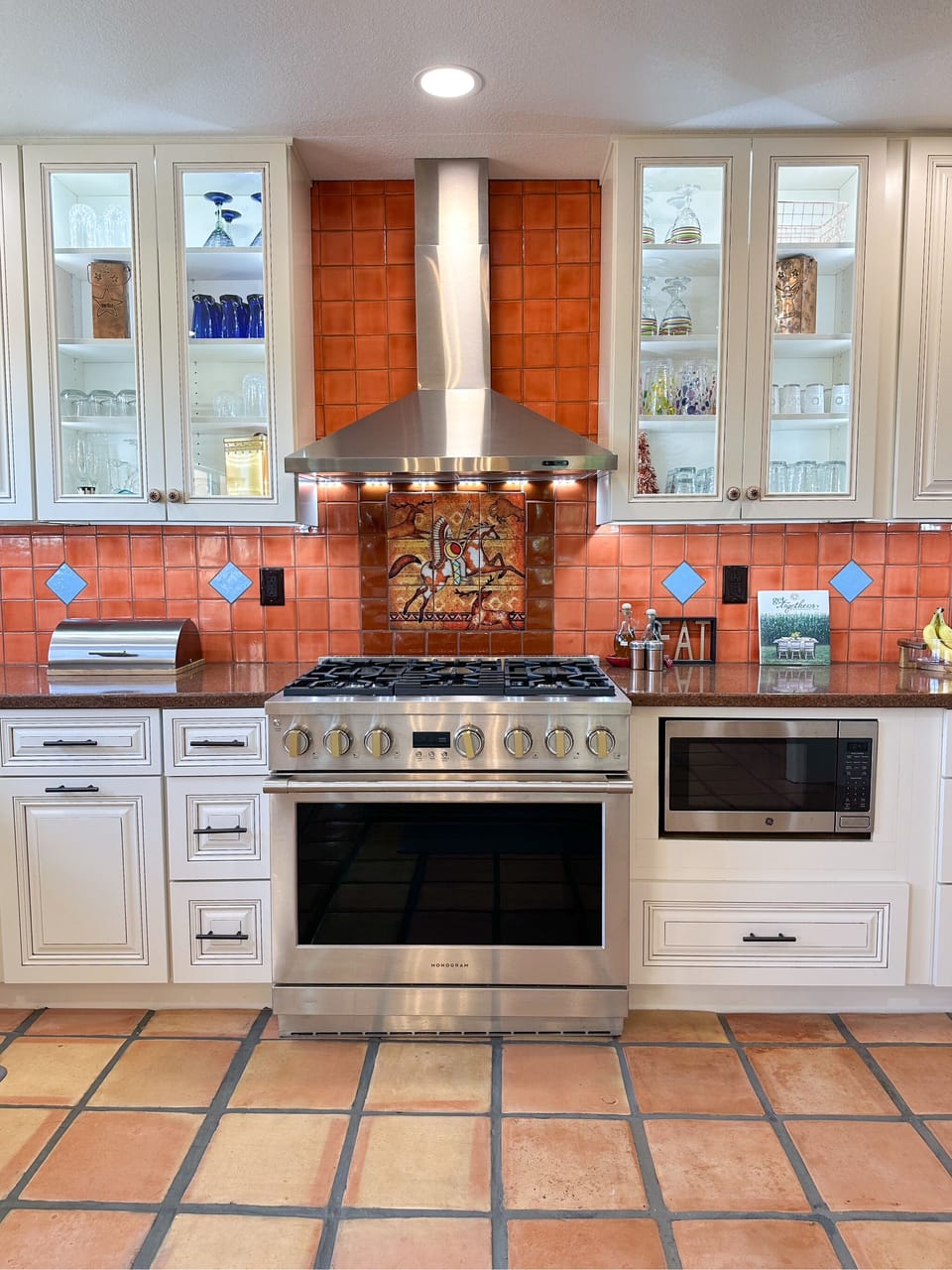 Monogram oven with 6 burner gas stove. Perfect for cooking and baking!