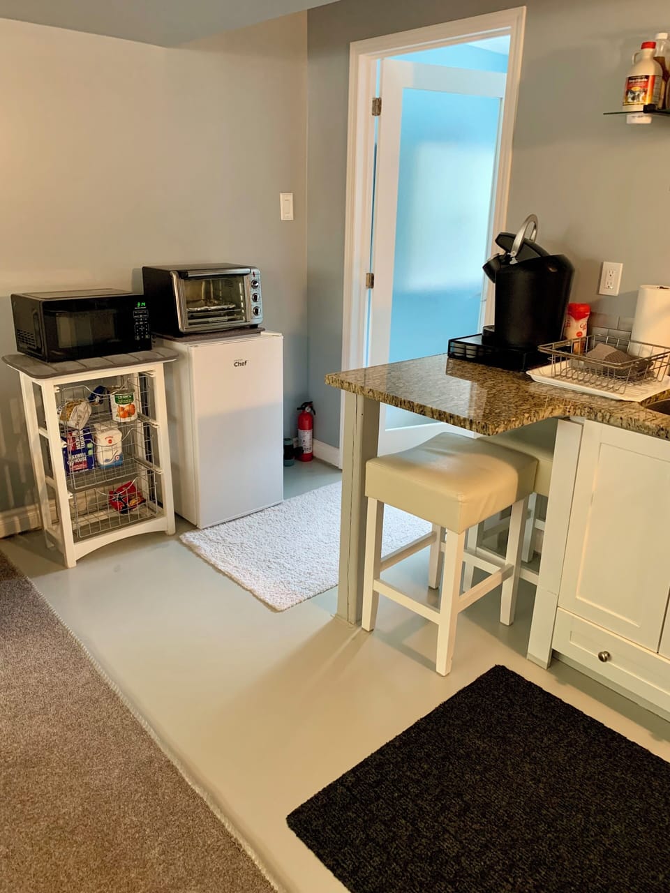 Pantry, mini frig with small freezer, breakfast bar