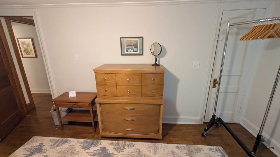 Upstairs Bedroom.  Dresser, magnifying mirror, ample hangers.  