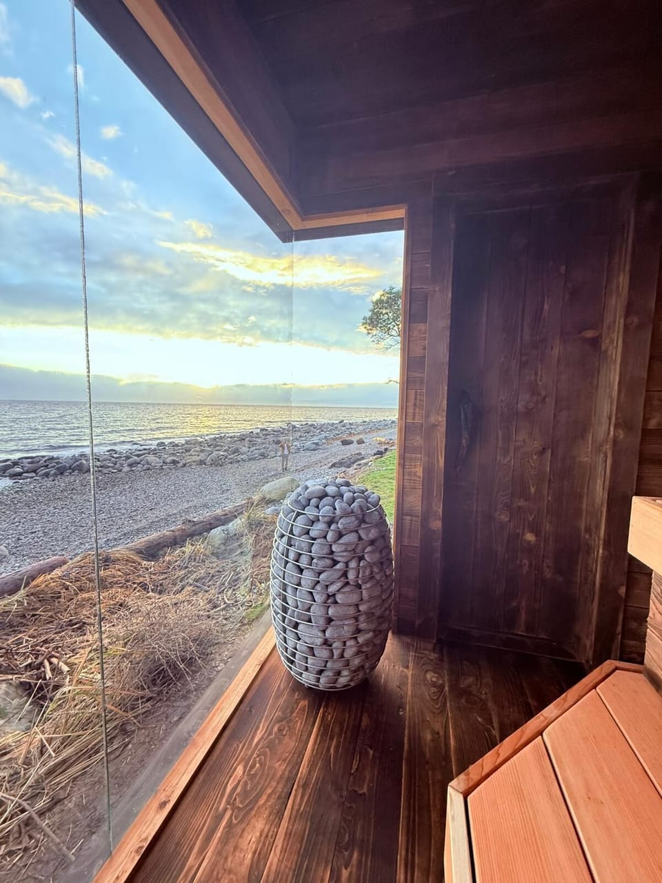 Enjoy the premium glass-panel sauna (optional add-on) reserve via our website