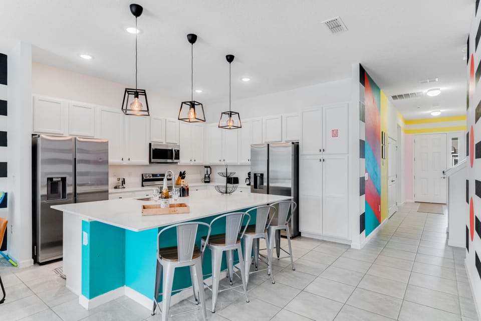 Have a few drinks at the kitchen island.