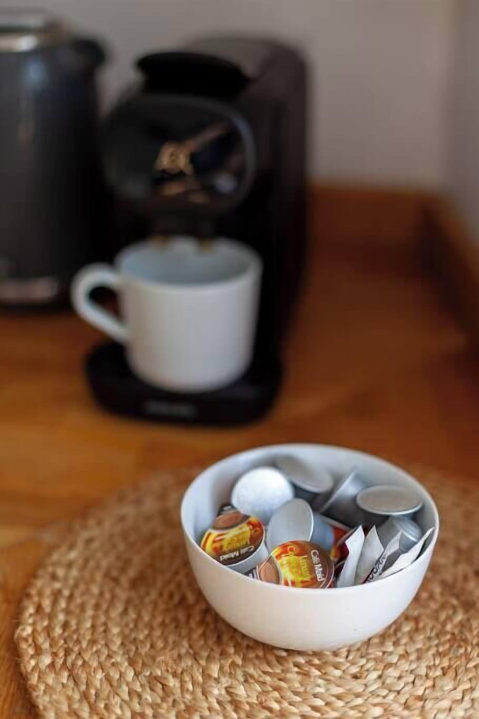 Coffee pods, sugar and milk pods available.