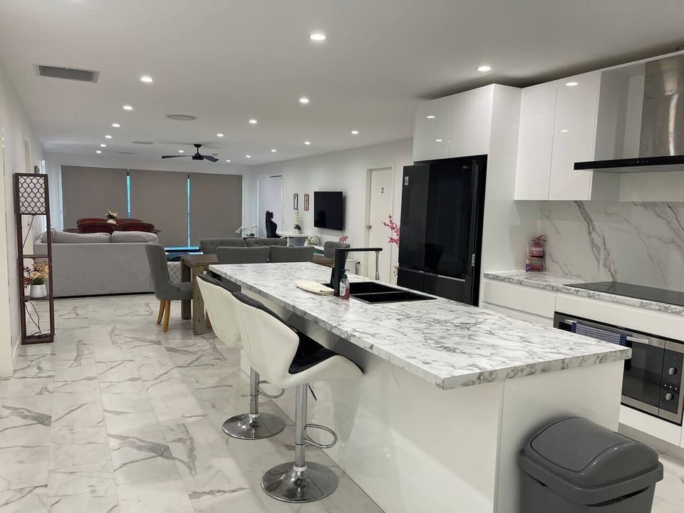 huge modern full kitchen and living area.