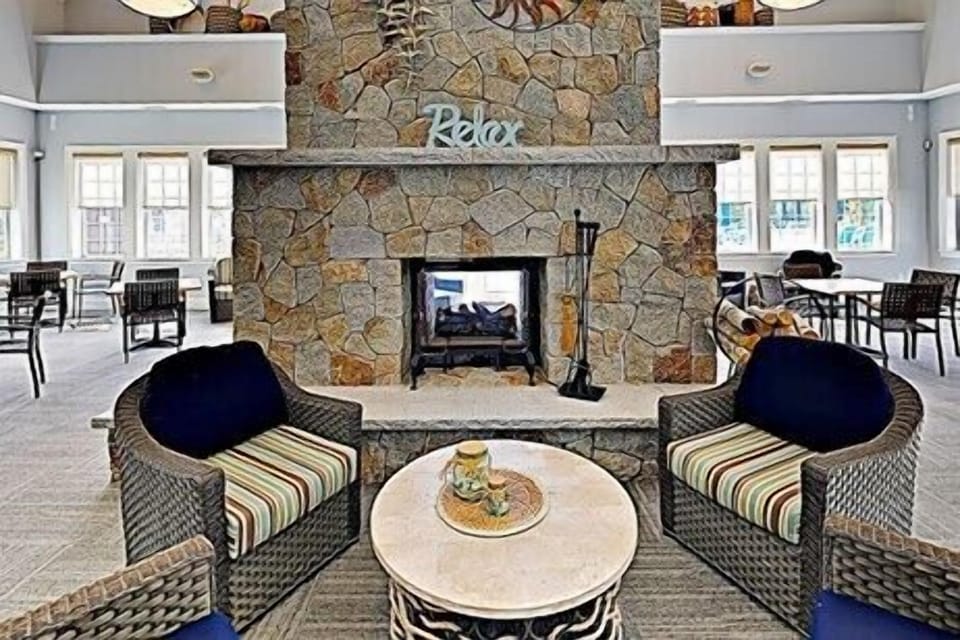 cozy spot in front of the fireplace in the club house