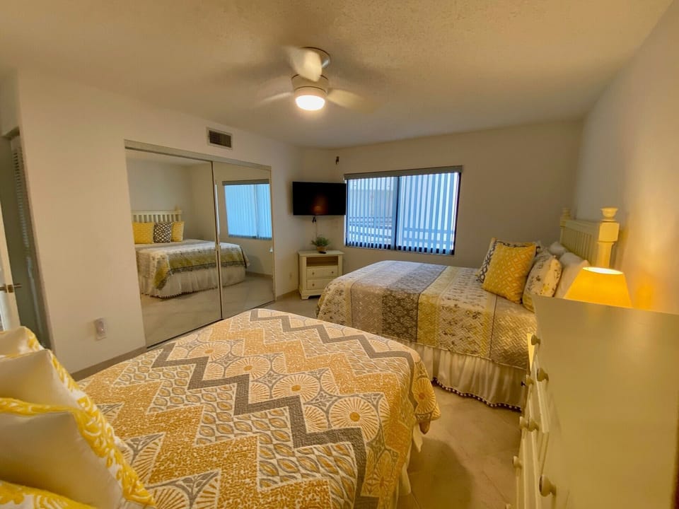 Guest bedroom three also features a TV, ceiling fan and full bath. 
