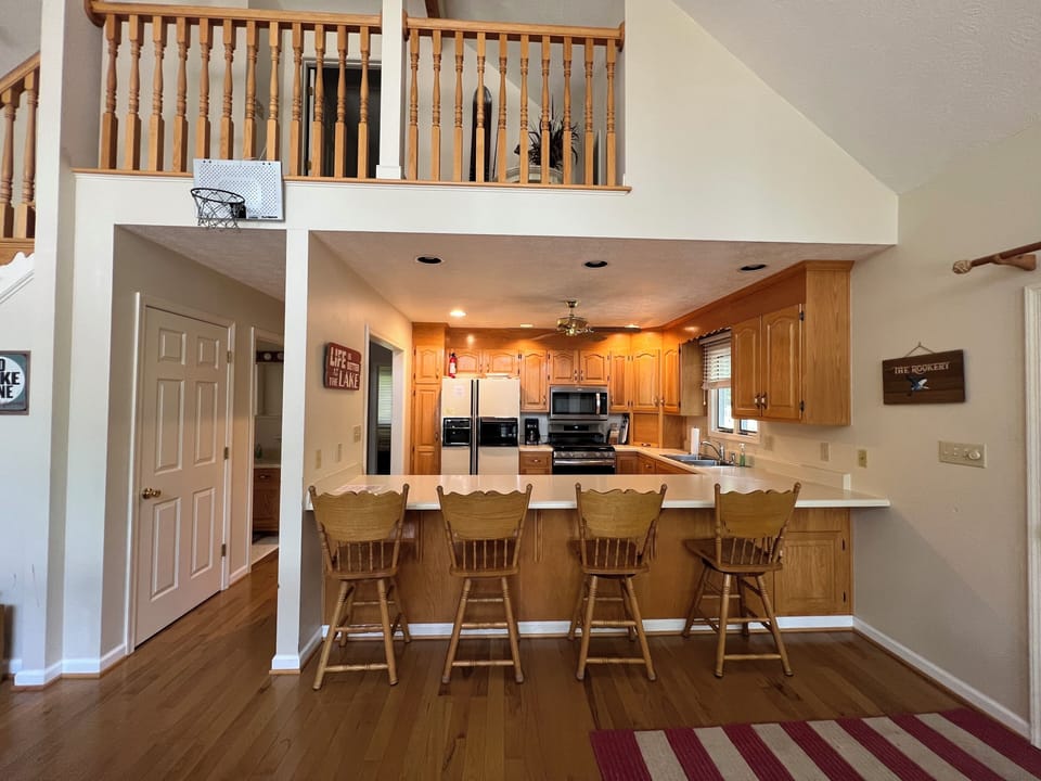 Breakfast bar with four stools.