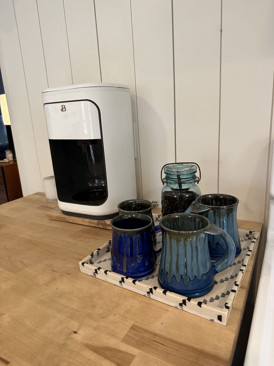 Coffee station in kitchen with complimentary coffee.