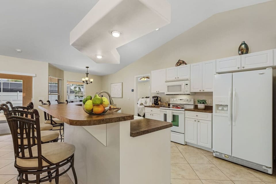Pull up to the counter and chat with the chef in this up to date kitchen.