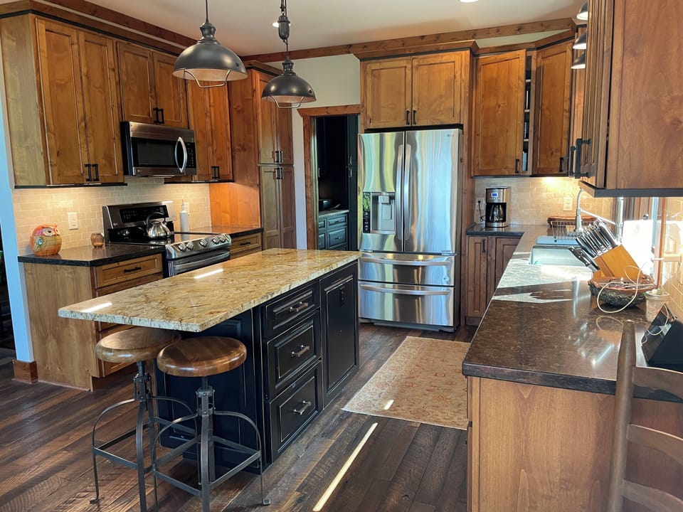 Kitchen - reclaimed barn wood floors 