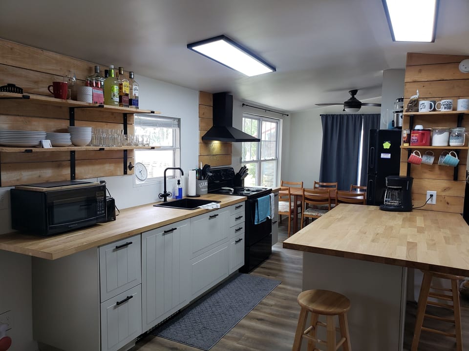 Fully capable kitchen for 8 guests. Coffee pot uses grounds. 