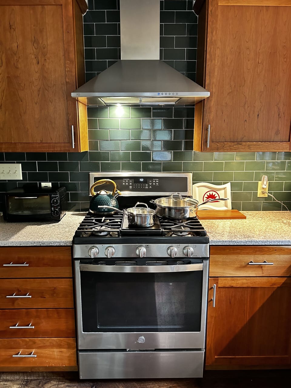Well-stocked kitchen with high-end cookware
