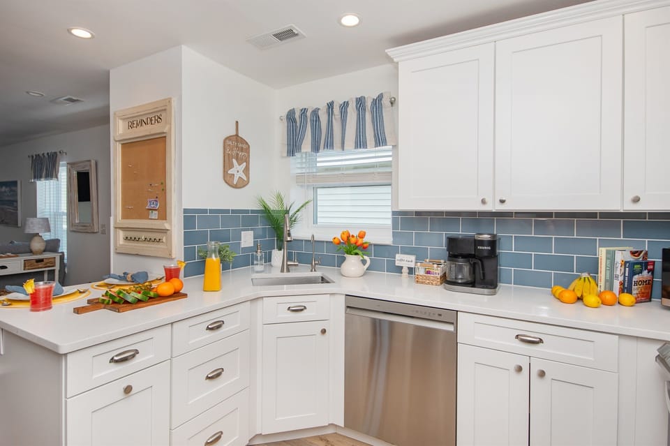 Kitchen sink with filtered cold water dispenser, perfect for filling water bottles and water jugs for a day at the beach!