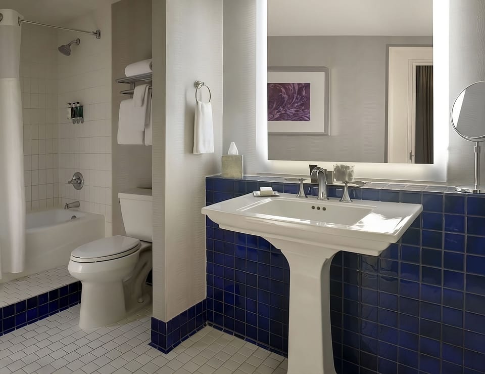 Start your day with a bright vanity and fresh towels.