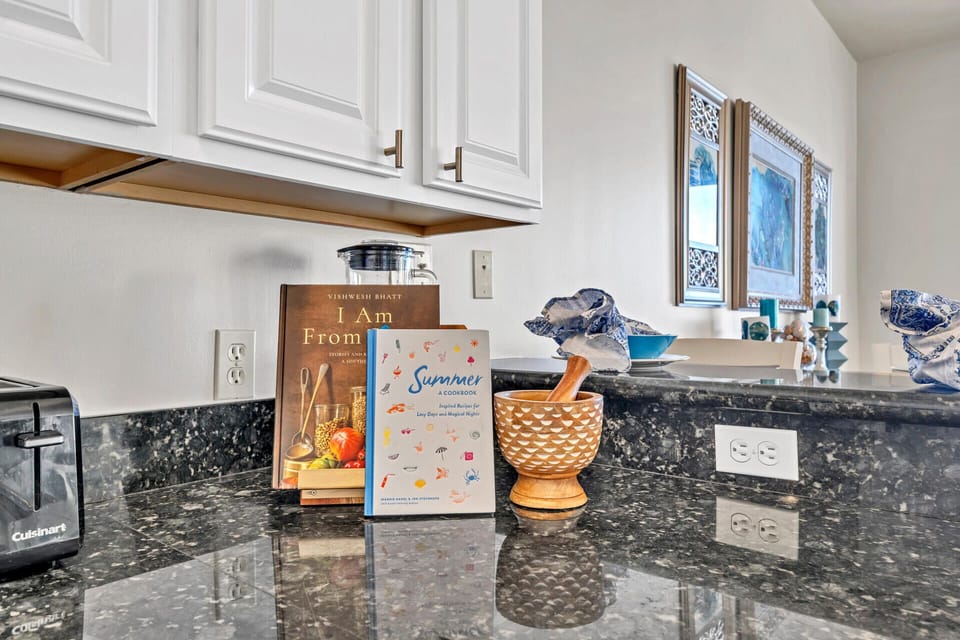 Your fully equipped kitchen features granite countertops and thoughtful touches, perfect for preparing meals during your stay.