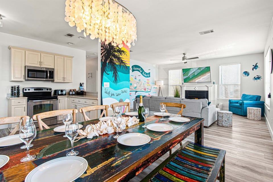 [Kitchen/Dining area Main house] Open Concept with plenty of seating options  Wine not included but ask us about some local Distillery and Breweries