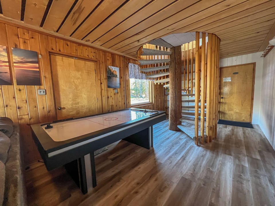 Enjoy the air hockey table located in the lower level family room.
