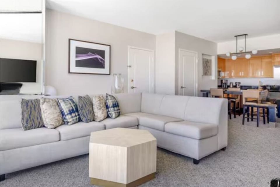 Comfy lounge with TV, projector screen and great views.