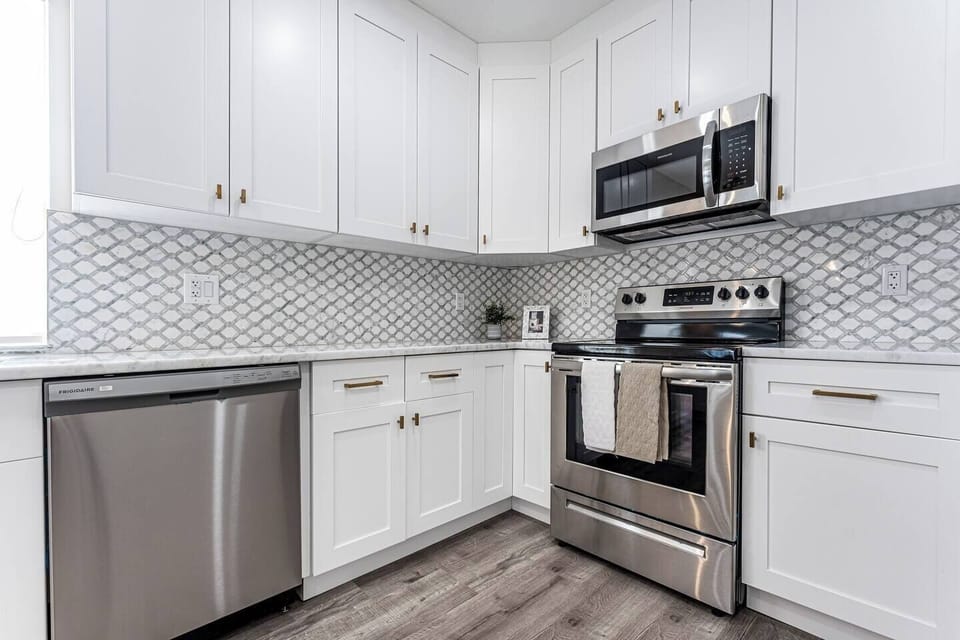 Cook or host a private chef in this spacious bright kitchen with stainless steele appliances and quartz countertops.