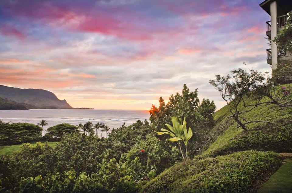 Soak in fiery sunset views over the ocean horizon