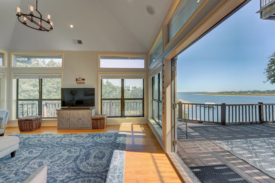 Double french doors in the living room open to the huge back deck.