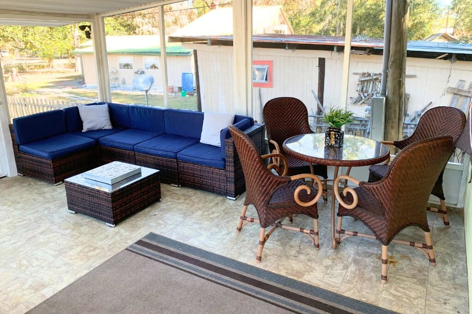 Porch Life, relax on the screened in porch, seats 12 with a mini fridge!