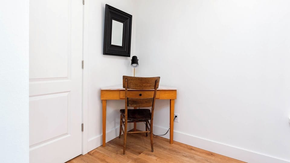 If you love to journal or just want a quiet space to catch up on things, the master bedroom also features a workstation.