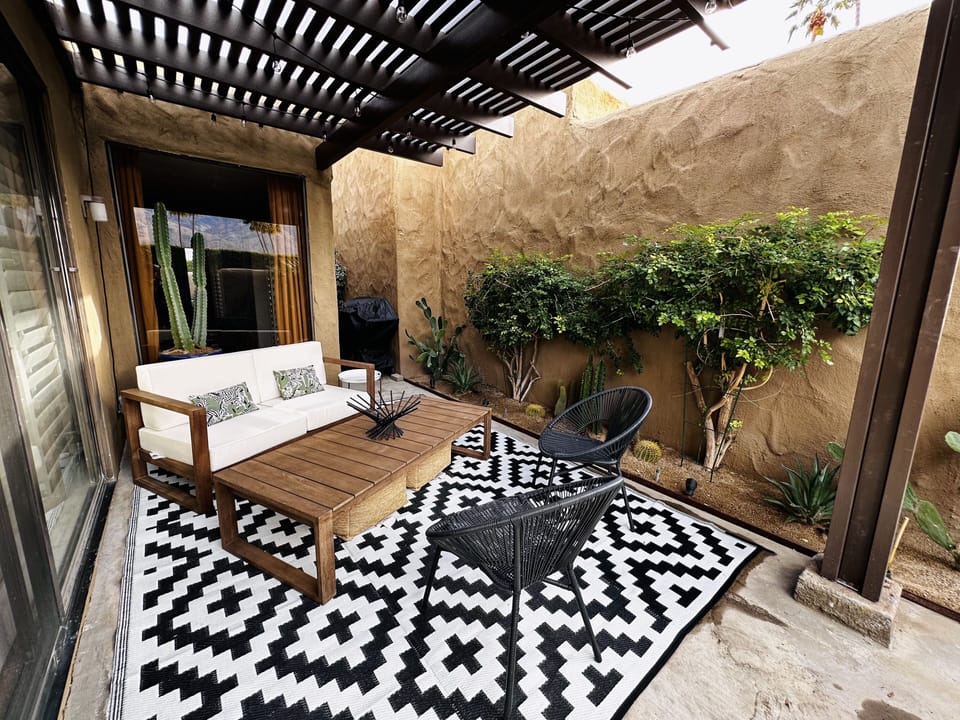 Private outdoor patio with beautiful desert landscape and newly built pergola