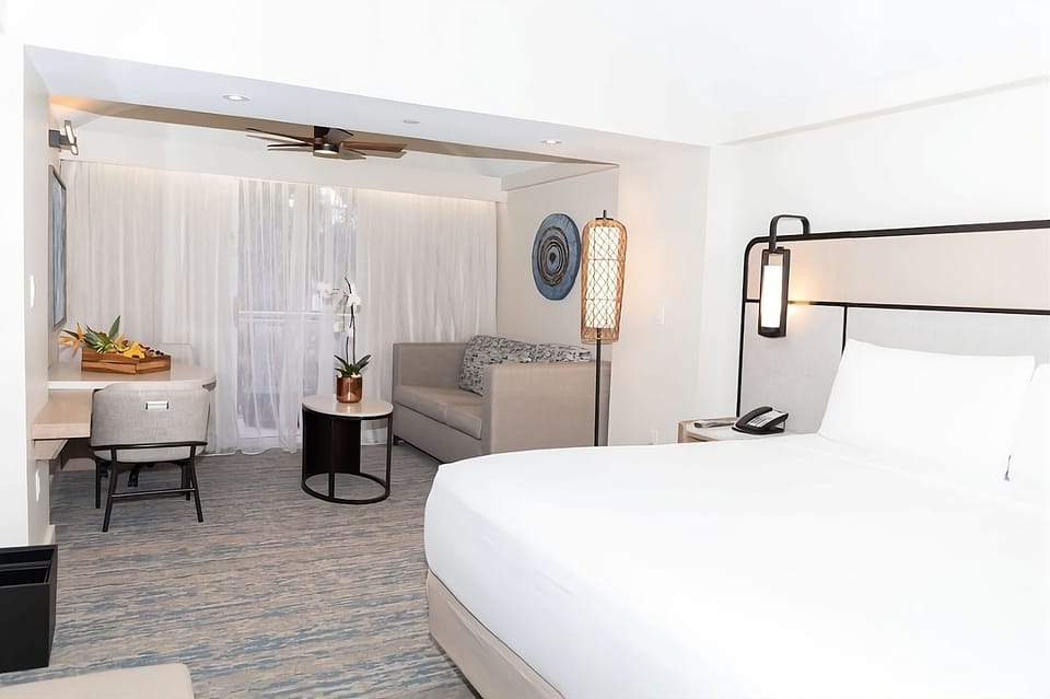 Stretch out in a spacious suite with seating and balcony.