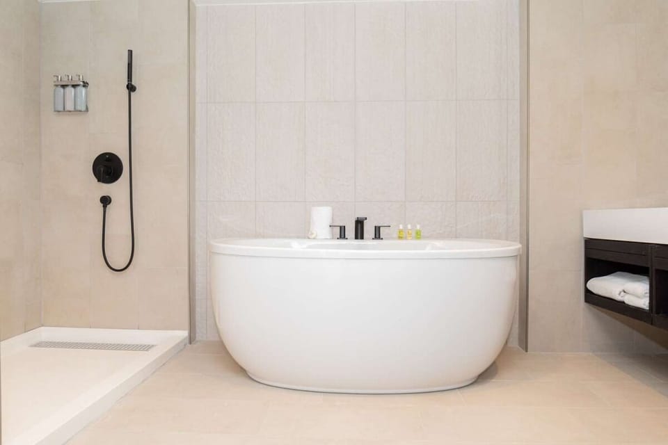 Soak and refresh in a spa-like tub and rain shower.