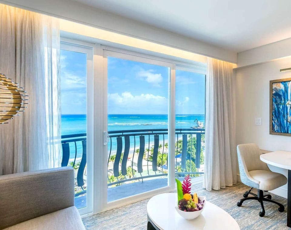 Lounge by sunlit sliders and let the ocean calm you.