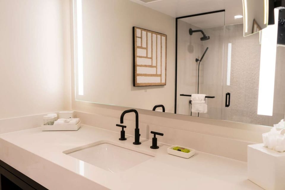 Rinse off in a modern shower with calming lighting.