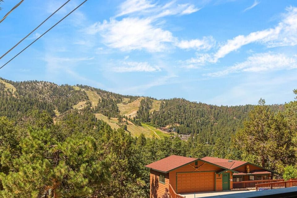 Views of the ski slopes from our home.  Home in the photo is not our home but the one across the street.