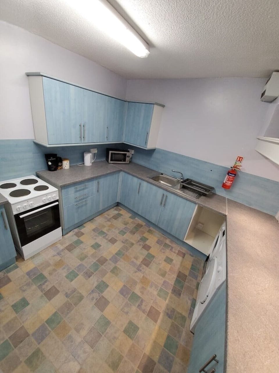 2nd kitchen with washing machine and dryer
